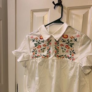 White shirt with floral detail